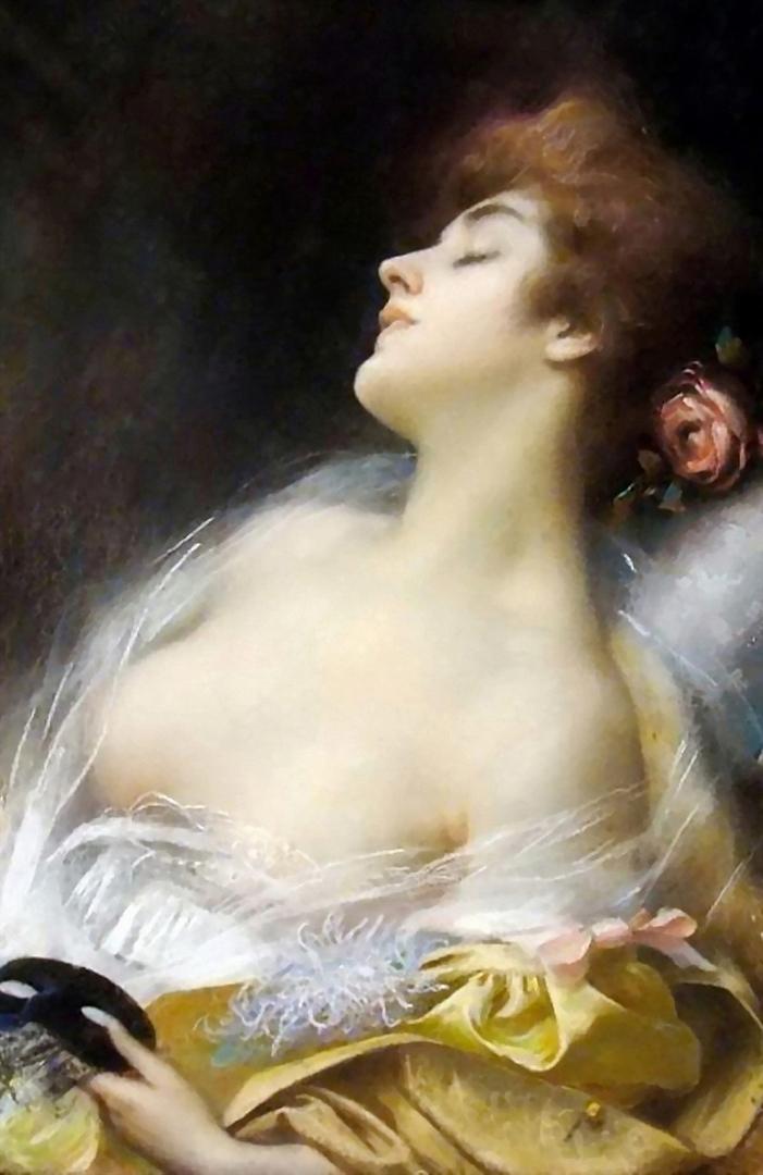 A young lady with a pretty rose in her hair and sensuous breasts is having an afternoon nap as she holds a black mask in her hand. She is wearing a yellow garment with sheer clothing underneath.